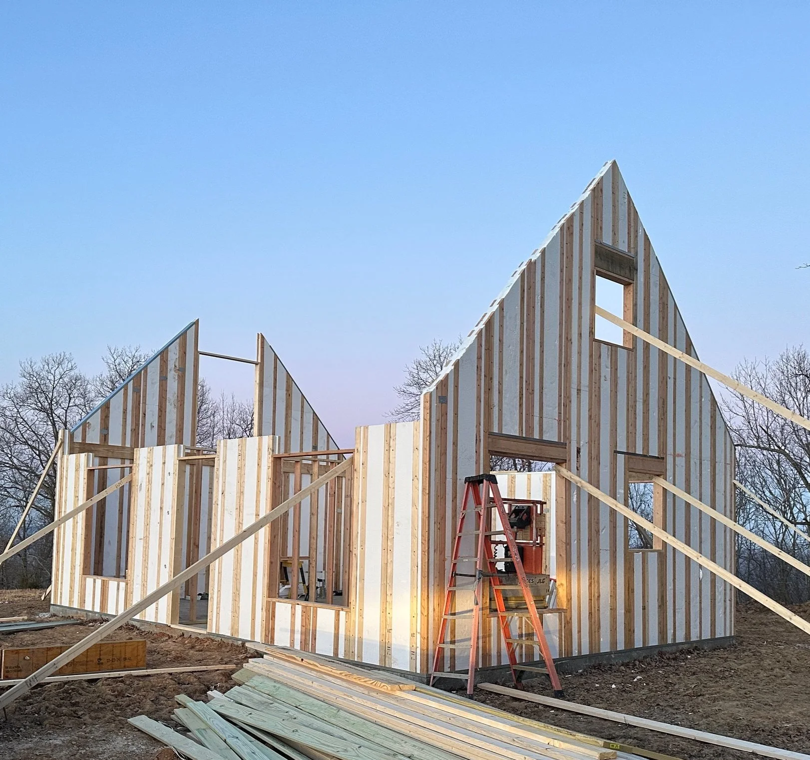 Tall ThermaTech IHP Wood and Wood wall panels forming a cabin gable